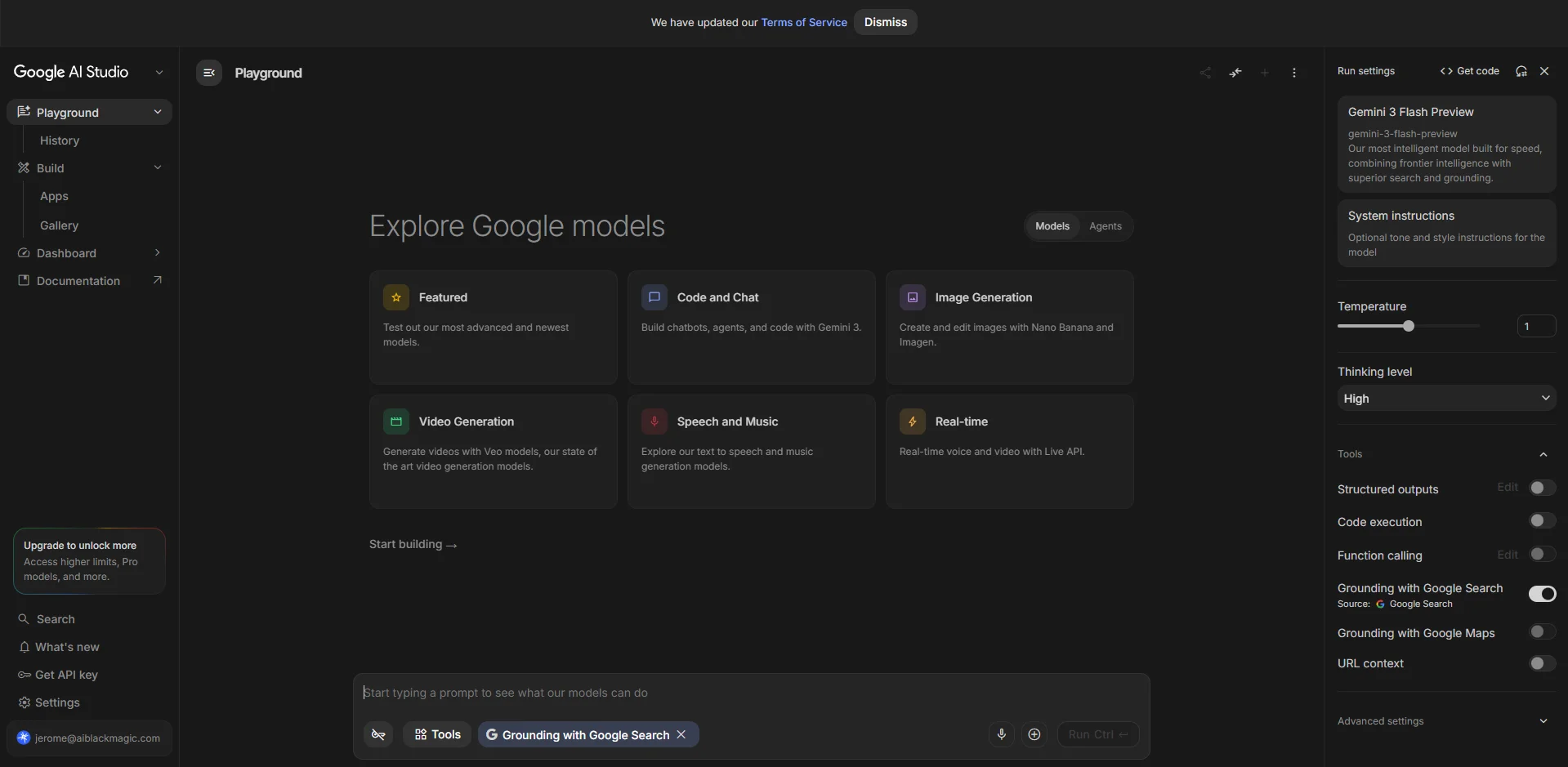 Close-up of the Run settings panel in Google AI Studio showing the selected model, System instructions, the Temperature slider, the Thinking level dropdown, and the Tools toggles including Structured outputs, Code execution, and Grounding with Google Search.